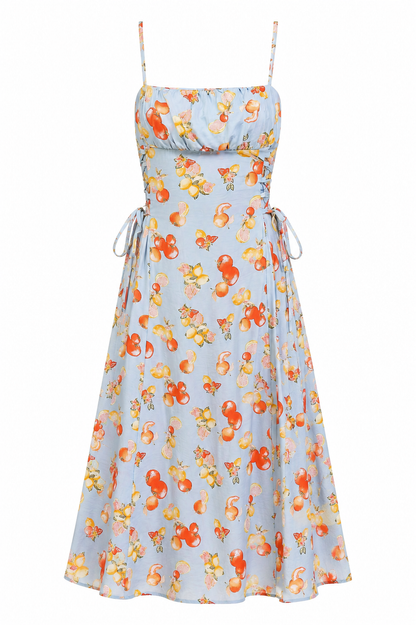Floral dress with orange and yellow flowers on a light blue background