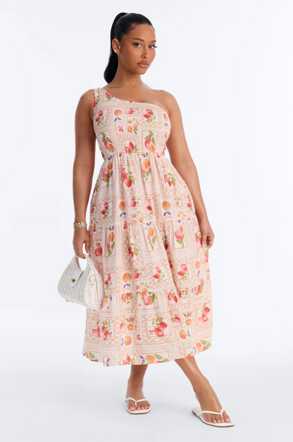Woman wearing a floral dress on a white background